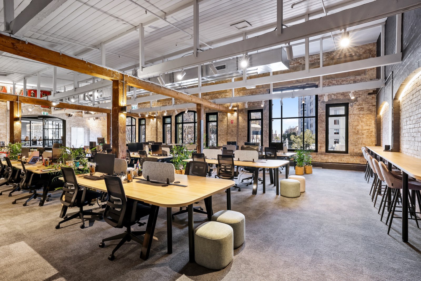 Ofload HQ warehouse office fitout with heritage brick, timber beams and new electrical and data services