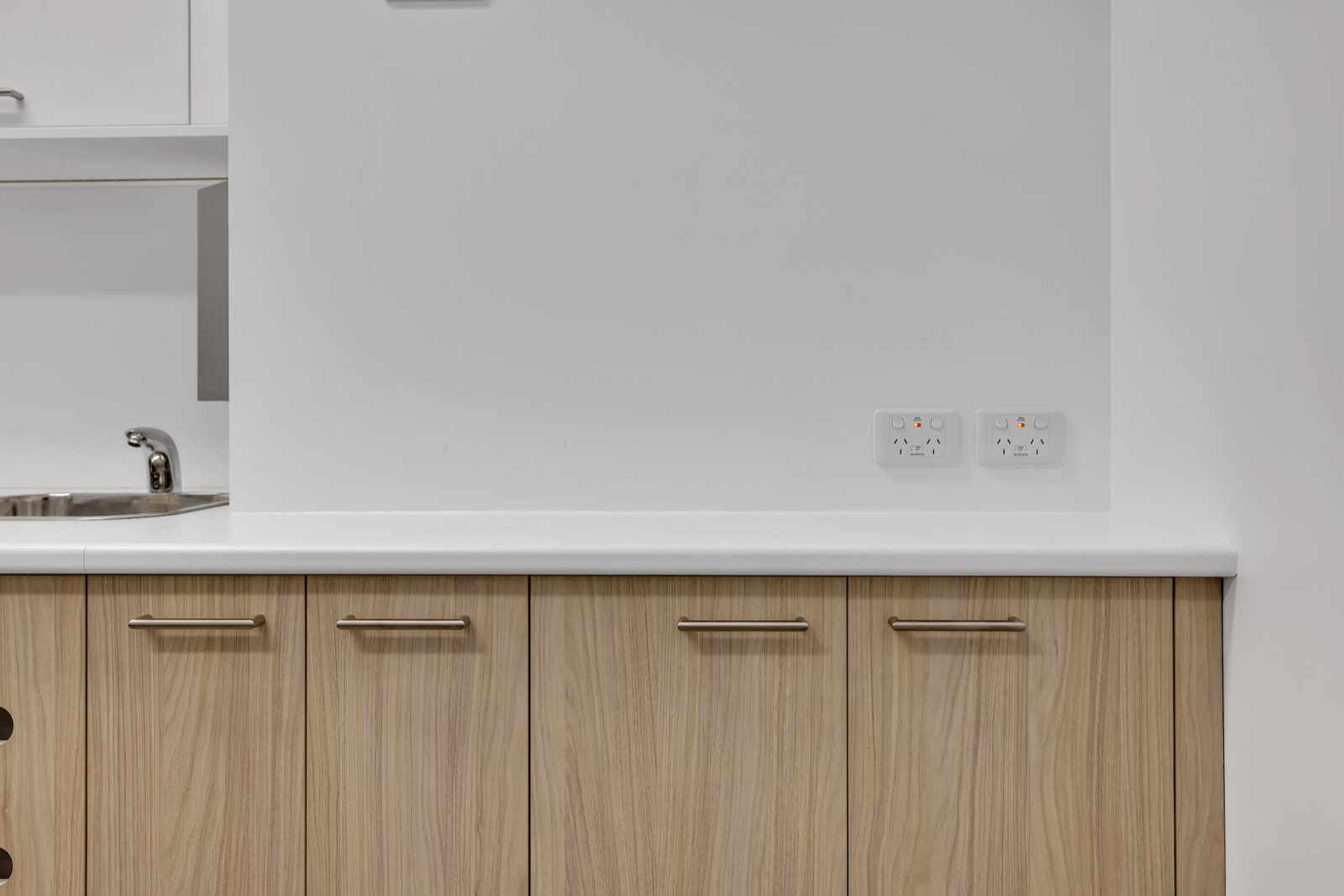 Clean joinery with RCD protected outlets at Narrabeen Dental, a Body Protected Areas certified fitout