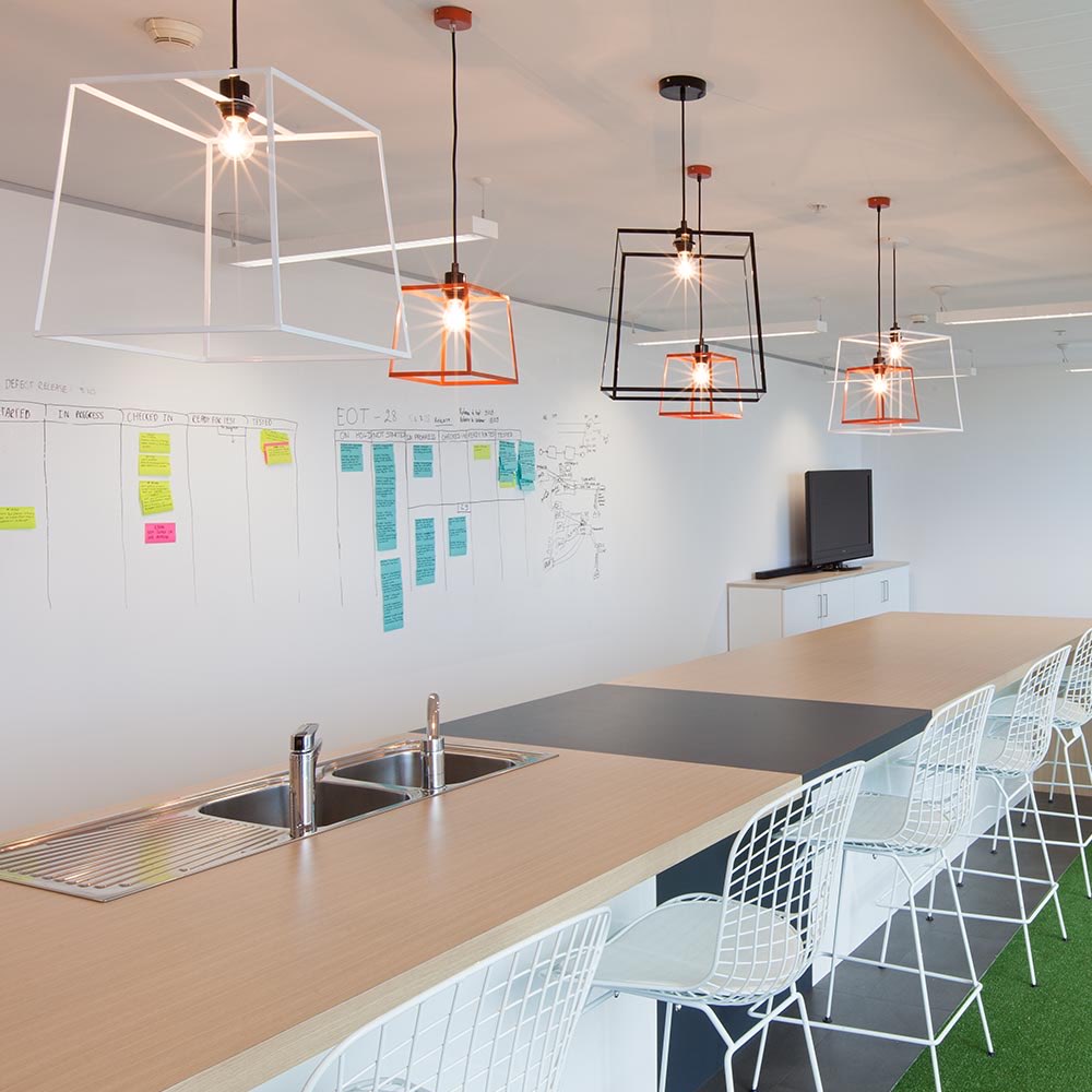 Feature pendant lighting installed by North Side Cabling at the Energy One office fitout